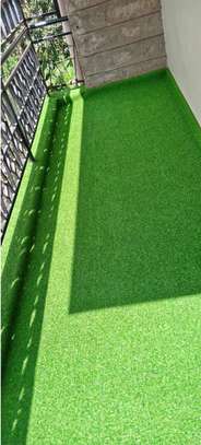 Well fitted artificial grass carpet on a balcony image 1