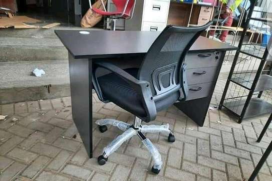 Computer desk with an adjustable office chair image 1