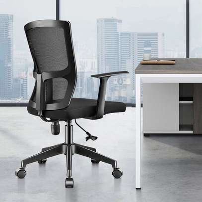 Office seat: Ergonomic medium back mesh office seat image 1