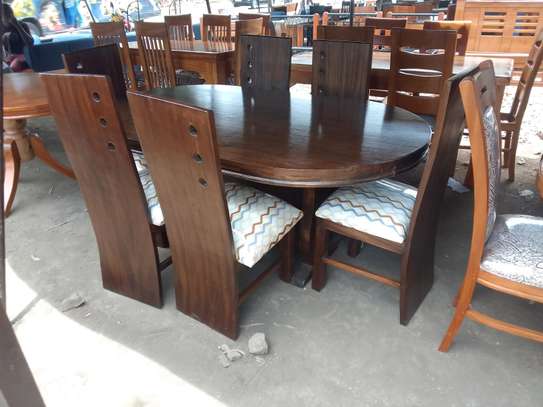 Dinning table with 6 chairs purely mahogany image 1