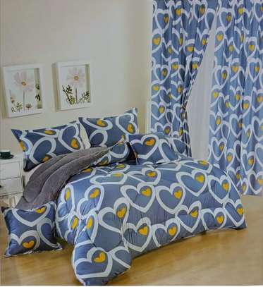 BEAUTIFUL MATCHING CURTAINS AND DUVETS image 2