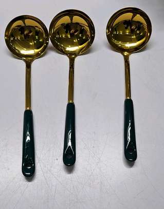 Single golden serving spoon image 12