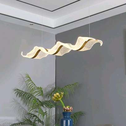 Modern contemporary brass and glass light image 1