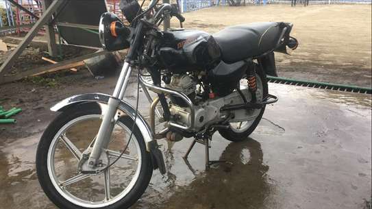 bajaj boxer 100cc mileage
