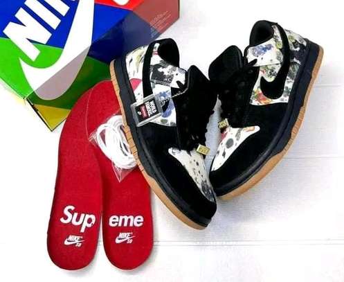 Supreme sb dunk sneakers image 1