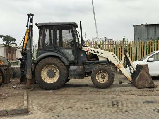 Backhoe and compressor for hire at affordable rate image 1