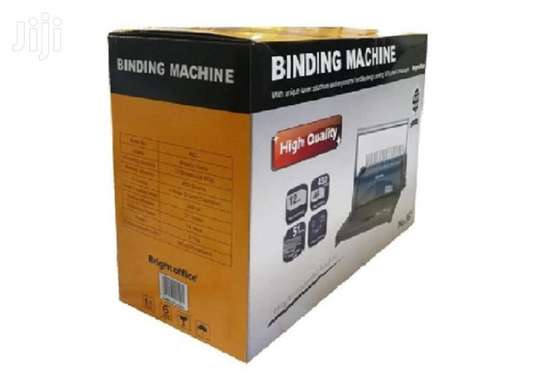binding machine bright office. image 1