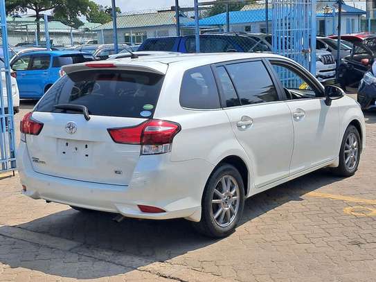 Toyota Corolla Sedan White Fuel Efficient Reliable image 2