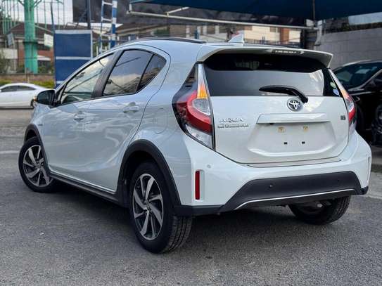 Make Toyota model Aqua white color fully loaded 2019 model. image 6