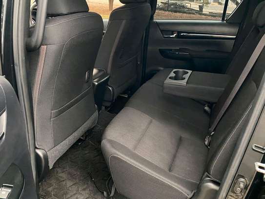 Toyota Hilux black color fully loaded 2019 model. image 7