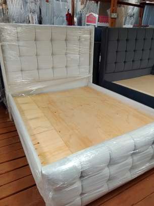 White Wooden Twin Bed Frame with Panel Design image 4