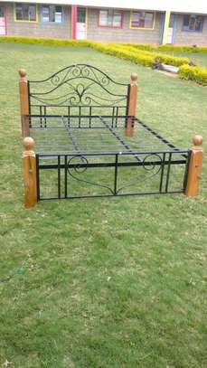 Quality and durable metallic beds with wooden finish image 3