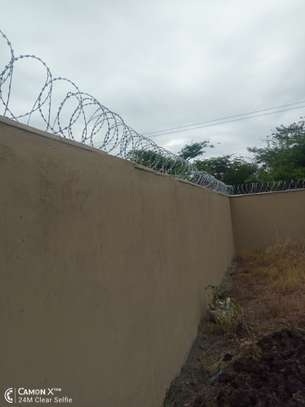wall top electric fencing installation in kenya image 8