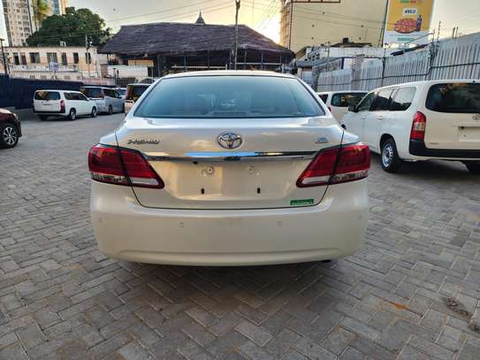 Toyota Premio white 2019 1500cc. F-grade image 12