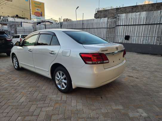 Toyota Premio white 2019 1500cc. F-grade image 13