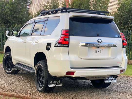 Toyota Land cruiser prodo TXL white color fully loaded image 9
