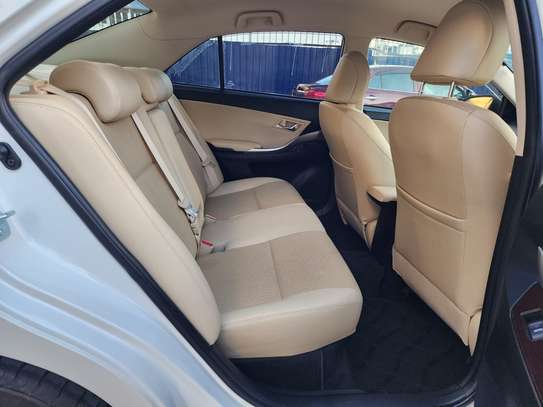 Toyota Premio white 2019 1500cc. F-grade image 9