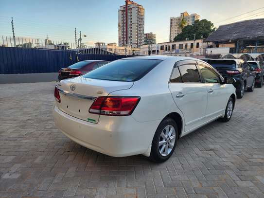 Toyota Premio white 2019 1500cc. F-grade image 11