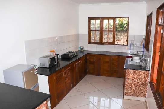BEACH VILLA FOR SALE IN DIANI image 10