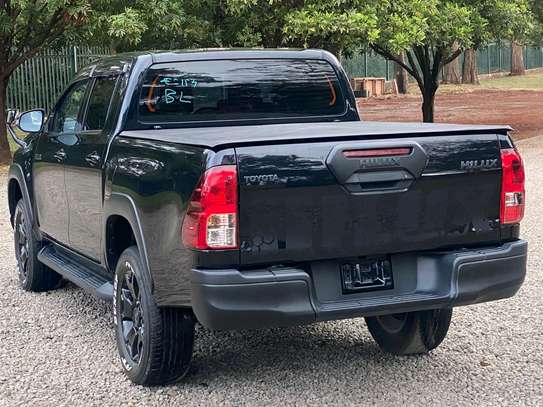 Toyota Hilux black color fully loaded 2019 model. image 2