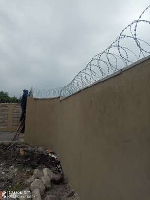 wall top electric fencing installation in kenya image 13