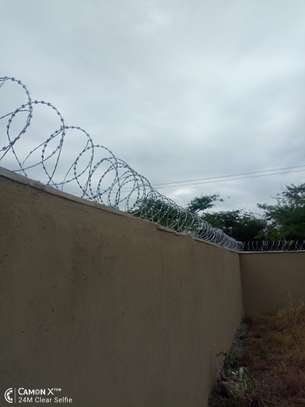 wall top electric fencing installation in kenya image 10