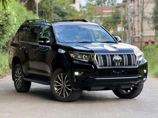 Make Toyota Land cruiser Prado TX black color fully loaded. image 2