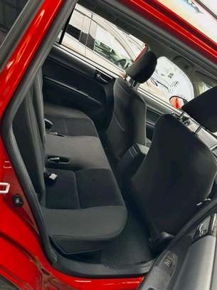 Daihatsu Compact Car Vibrant Red Efficient Ride image 4
