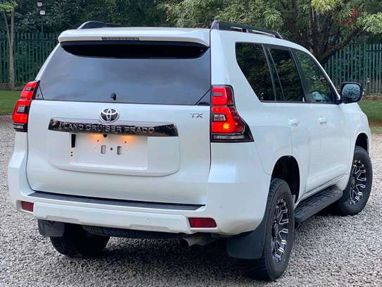 Toyota Land cruiser prodo TXL white color 2021 model. image 8