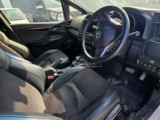 Mazda 3 silver sedan image 2