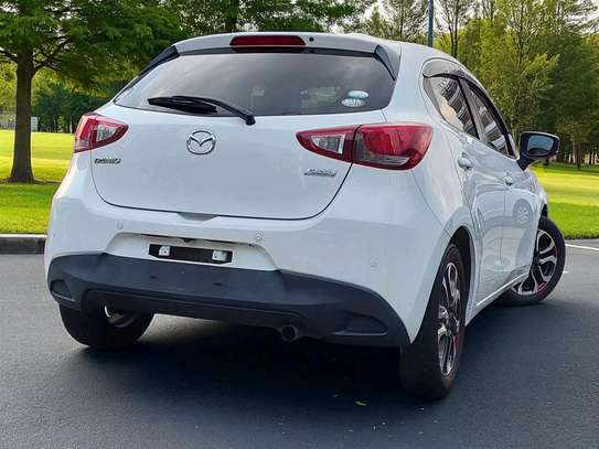 Mazda Demio 
Year 2019
Model fully loaded white color. image 7