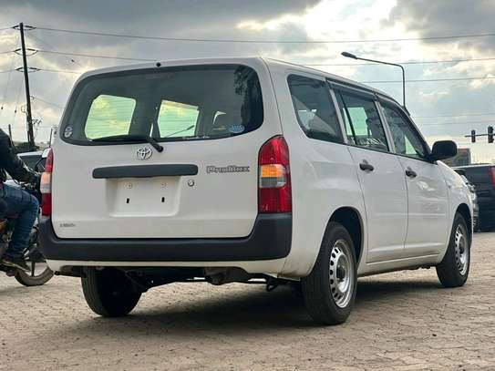 Make Toyota Probox 2017 model white color fully loaded. image 4