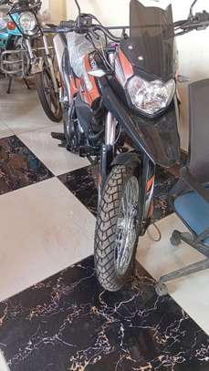 Off-Road Motorcycle Black Orange Rugged Design image 2