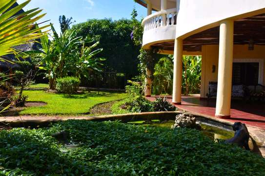 5 bedroom stand furnished alone villa in south coast diani image 2