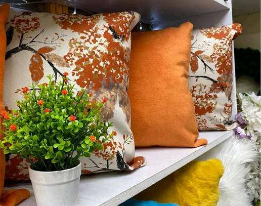 Patterned throw pillows. image 1