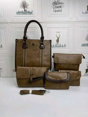 *Quality Original Designer Ladies Business Casual Rubber 5 in 1 Legit  Handbags Backpack Clutch Wallet Set*
. image 2