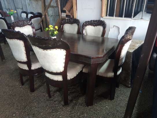 6 seater dining table made by hand wood maonganyi image 3