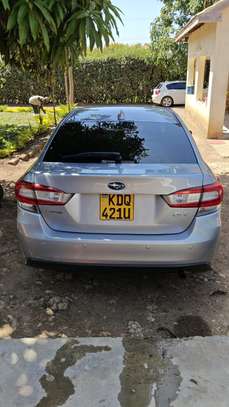 Subaru Impreza Sedan Silver Fuel Efficient Reliable image 2
