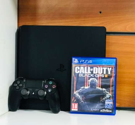 PS4 Slim 500gb Ex Uk Preowned Console With Black Ops 3 Game image 1