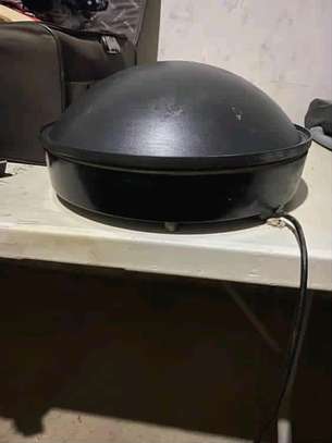 A chapati or flat bread maker image 2