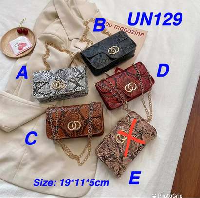 Sling bags with chain straps image 1