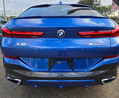 Make BMW X6 Blue colour 2020 model fully loaded. image 2
