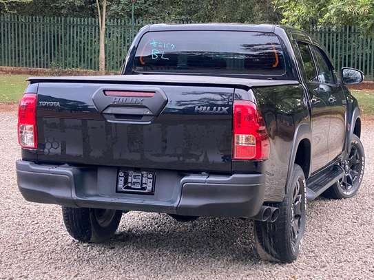 Toyota Hilux black color fully loaded 2019 model. image 4