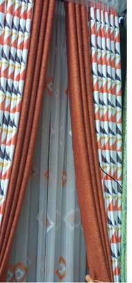 Patterned Orange Curtains and Sheers image 1