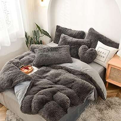 Fluffy duvets with one bed sheet one duvet four pillow cases image 3