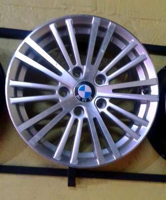 18 Inch BMW alloy rims silver colour Brand New free fitting image 1