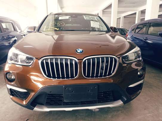 BMW X1 beige petrol 2017 image 1