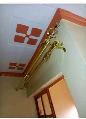 Gold long curtain rods.. image 2