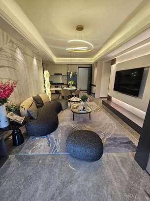 Luxury Living & Dining Room with Marble Floors image 13