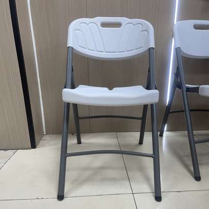 Foldable chair: White foldable armless outdoor chair image 2